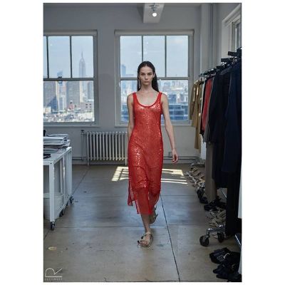 Brittani Klein wearing a red dress from Dion Lee.